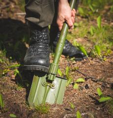 Danish M-1943 Style E-tool, Surplus. You can, for example, dig with this thing.