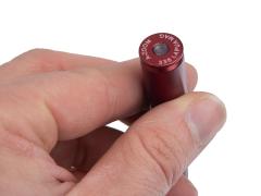 A-Zoom Snap Caps. Instead of a primer, these have a buffer to soften the impact of the firing pin / striker.