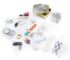 BCB Mountain Survival Tin. This contains craploads of stuff. Read the product description to find out what.