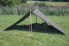 NVA Tent Stake and Pole Set, 30 Piece Set, Surplus. A display of the simplest tent.