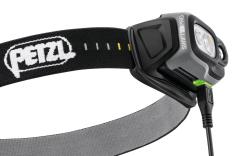 Petzl Swift RL PRO headlamp. The headlamp has a rechargeable battery and the charging cable is included.