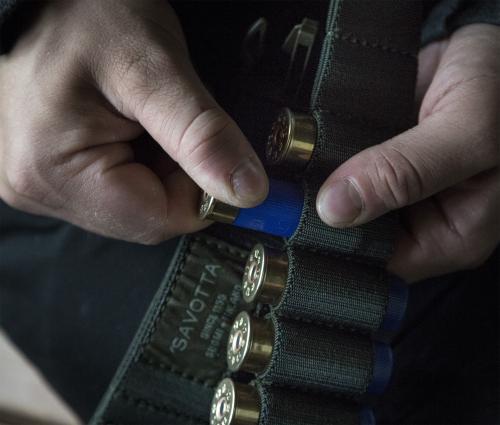 Savotta Rekyyli cartridge belt. The cartridges are held securely in place, but won't put up a fight against your firm grasp.