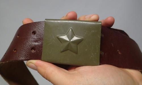 Czech leather belt, surplus. Metal buckle, sometimes with a subdued star emblem, sometimes the buckle is just plain.