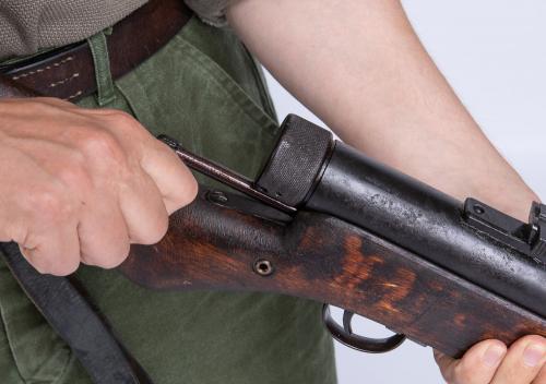 Finnish M/31 Suomi SMG, with muzzle brake, deactivated. The charging handle moves but the bolt remains fixed.