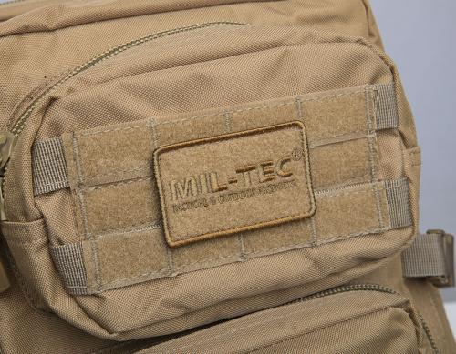 Mil-Tec Assault Pack Large. Loops base on top accessory pocket for patches.