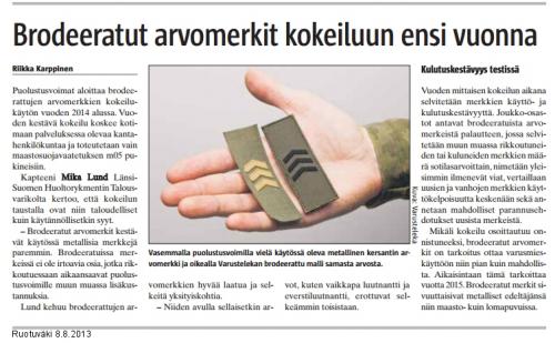 Särmä TST Finnish M05 Rank Insignia. A Finnish newspaper article from 2013 describing trials of embroidered insignia in the FDF.