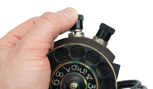 Swedish number scroll for field telephone, with leather case, surplus.