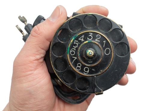 Swedish number scroll for field telephone, with leather case, surplus.