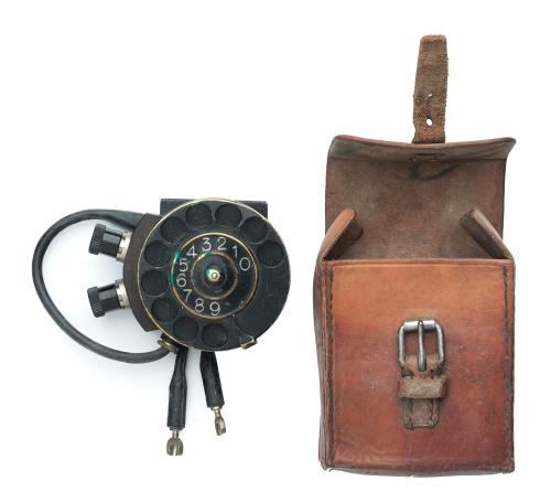 Swedish number scroll for field telephone, with leather case, surplus.