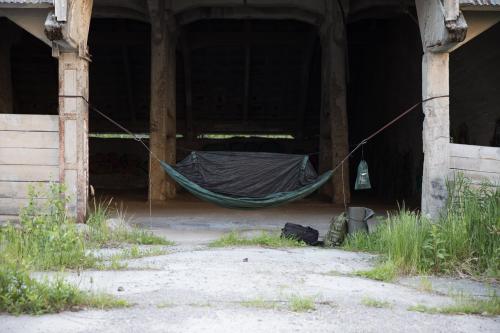 DD Hammocks Frontline Hammock. Frontline hammock in urban use. Whoopie Slings, Tree Huggers and Spectre carabiners are sold separately.