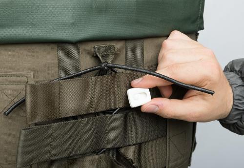 Sioen Tacticum Vest, NIJ IIIA. A damn difficult-to-use cord lock, we recommend just putting a good know on the shock cord instead of using this little devil.