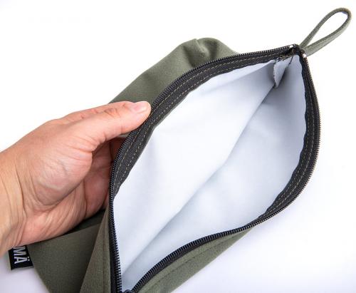 Jämä Toiletry Pouch. White on the inside, so nothing will go unnoticed.