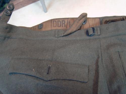 NVA wool trousers, old model. Traditional adjustment tabs on the sides.