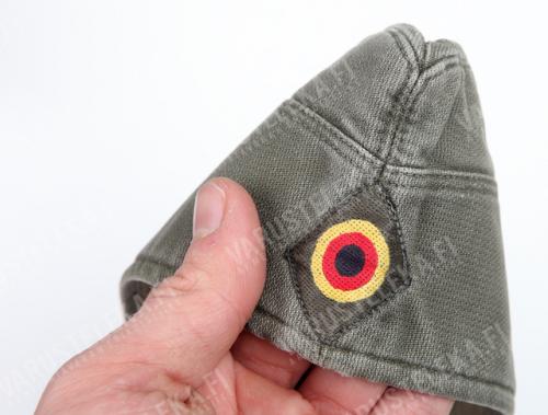 BW side cap, grey green, surplus. The "shoot here" emblem of the West German Bundeswehr. Finns also have a similar roundel in white and blue!