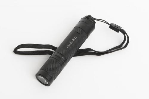 Fenix E12 flashlight. Lanyard for clumsy people.