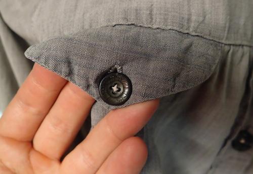 Lotta-Svärd uniform #1. Some buttons have cracks on them.