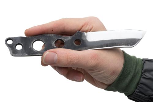 Terävä Skrama 80 Bare Tang. The spine has been ground and beveled to strike sparks from ferro rods.
