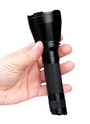 Fenix TK32 flashlight. Medium body and large bezel.