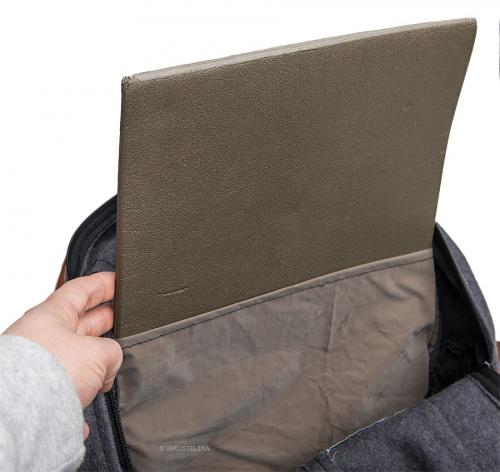Jämä wool backpack. Inside a moderate stiffener cut up from junk quality German sleeping mats.