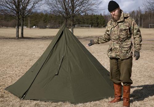 Polish two-man tent, surplus. The handsome guy in the picture is 175 cm tall.