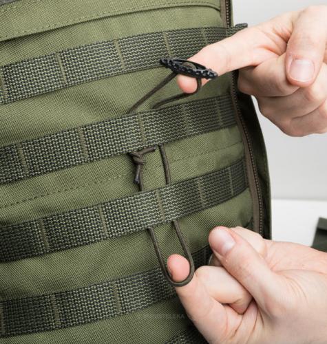 ITW GT Tactical Toggle. A piece of shock cord and a Tactical Toggle can be used to create a super simple tie down system for PALS webbing bases.
