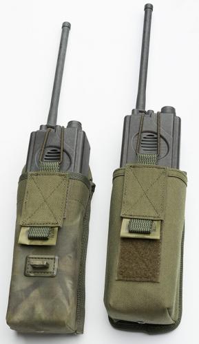Särmä TST LV141 pouch adapter. Attaches to the hook or loop on the front of the pouch.