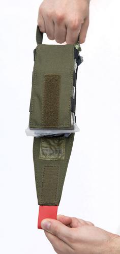 Särmä TST Pull-Out IFAK insert. The insert opens up by pulling on the red tab.