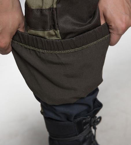 Tactic-9 Gorka field trousers, brown. Snow lock feature on the leg.