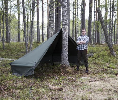 Savotta Hawu 8 tent components. The rear half pitched as a lean-to shelter.