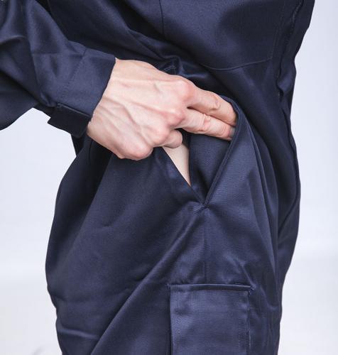 British Coverall, Flame Retardant, Navy, Surplus. Access/ventilation holes behind regular front pockets.