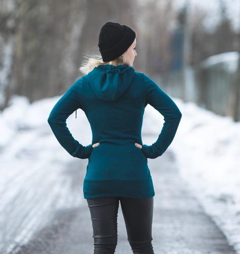Särmä Women's Merino Wool Hoodie. The model is 154 cm tall and wears size X-small.