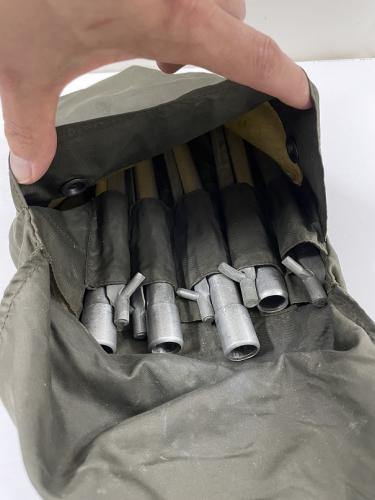 Austrian Shelter Half with Pegs and Poles, Olive Drab, Surplus. Everything fits nicely in the carrying bag.