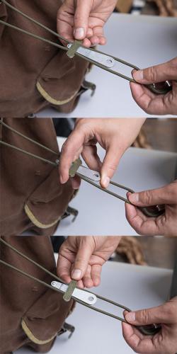 Finnish cord lock, metal, surplus. From top to bottom: open and closed. Simple.