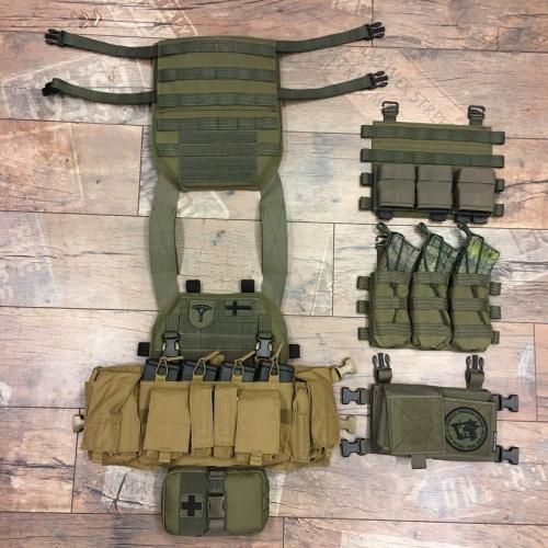 Särmä TST PC18 Plate Carrier w. Elastic Cummerbund. The PC18 is compatible with numerous "swiftclip" chest rigs and placards.
