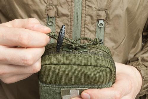 Särmä TST IFAK pouch. Pro-tip: non-locking zippers are easy and quick to open, and that is how it should be with an IFAK. But, if you want some extra security we recommend using an ITW Tactical Toggle as shown!