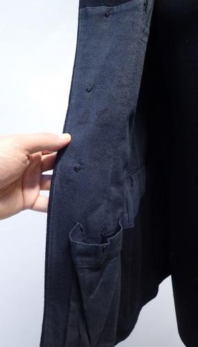German / Finnish fireman's wool tunic #2. You can very faintly see the Wehrmacht sizes on this side of the tunic.