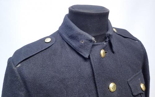 German / Finnish fireman's wool tunic #2. Note the small hole on the collar.