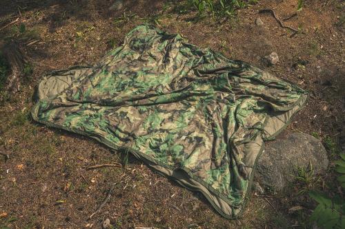 British jungle sleeping bag, surplus. The tie-cords correspond almost perfectly with the US Woobie!