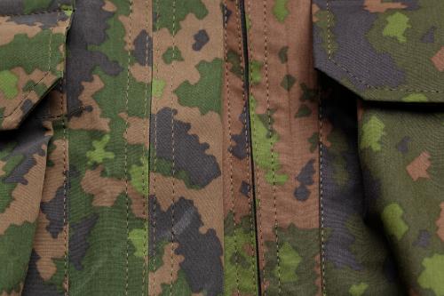 Särmä TST L6 Hardshell pants. Old material on the left and the new material on the right.