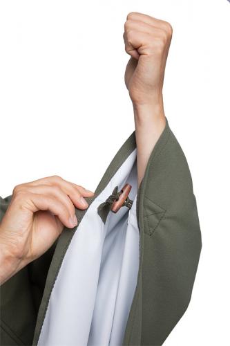 Jämä green Luhka. The "sleeve cuffs" have a wooden toggle