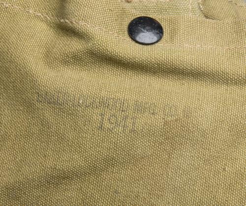 US M-1941 Mountain Rucksack #1. The markings are there, although faded. The most important, which is the date, is 1941.