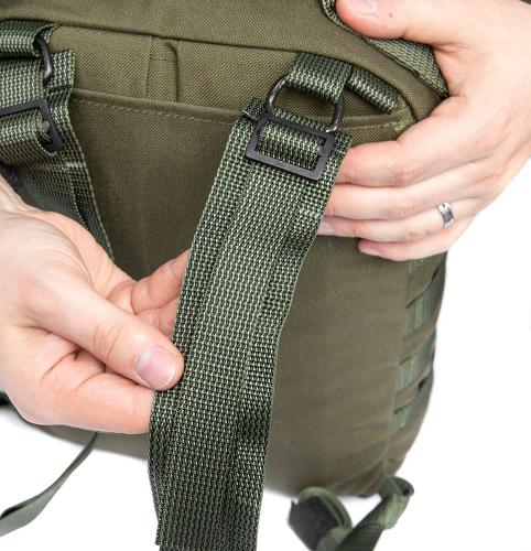 Särmä TST CP15 Combat pack. Secure by passing the end once more through the slide buckle.