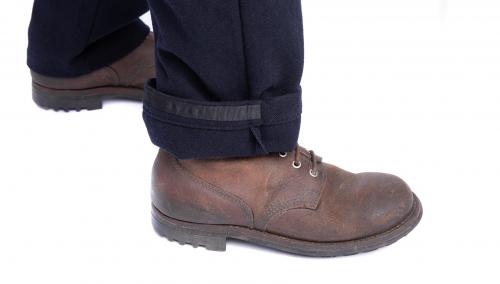 Särmä Worker Pants, Wool. A close-up on the leg cuff. Note the reinforcement strip on the inside.
