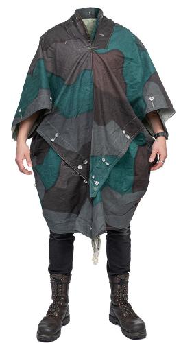 Swedish tent quarter/cape, surplus. Used here in poncho form. Pictured here is an unused example.