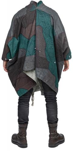 Swedish tent quarter/cape, surplus. Used here in poncho form. Pictured is an unused example.