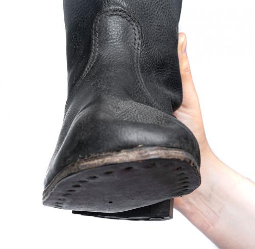 Soviet leather jackboots with leather soles, WW2 model, surplus. The leather soles ma be a bit bent due to long storage, but will straighten up with use.
