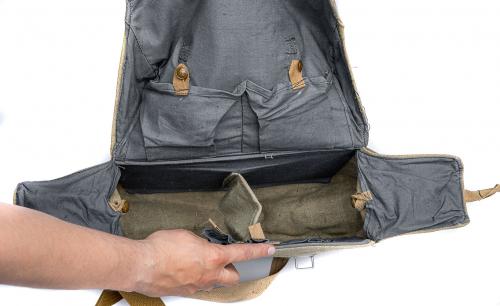 Soviet medic bag, surplus. Like everything good and proper, the insides are divided. You can remove the center divider if you want to fit a laptop inside.