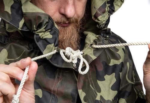 Romanian Plash-palatka Rain Cape/Shelter Half, Camouflage, Surplus. Tighten the hood with these cords.