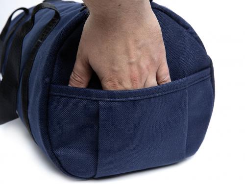 Jämä Duffel Bag. Both ends feature a small open pocket.