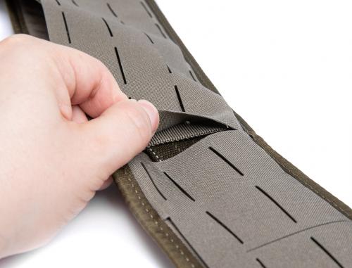 Särmä TST Battle Belt. You can push the duty belt completely under the laser-cut PALS webbing or  weave the belt under and over various sections of the webbing, which enables you to attach stuff on the duty belt as well.